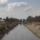 A concrete-lined irrigation canal in Egypt's Nile Delta.
